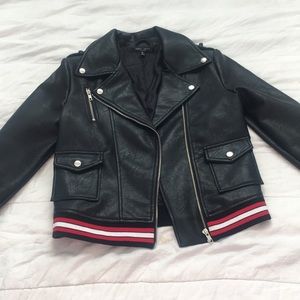 Size Medium black leather jacket. Never worn.